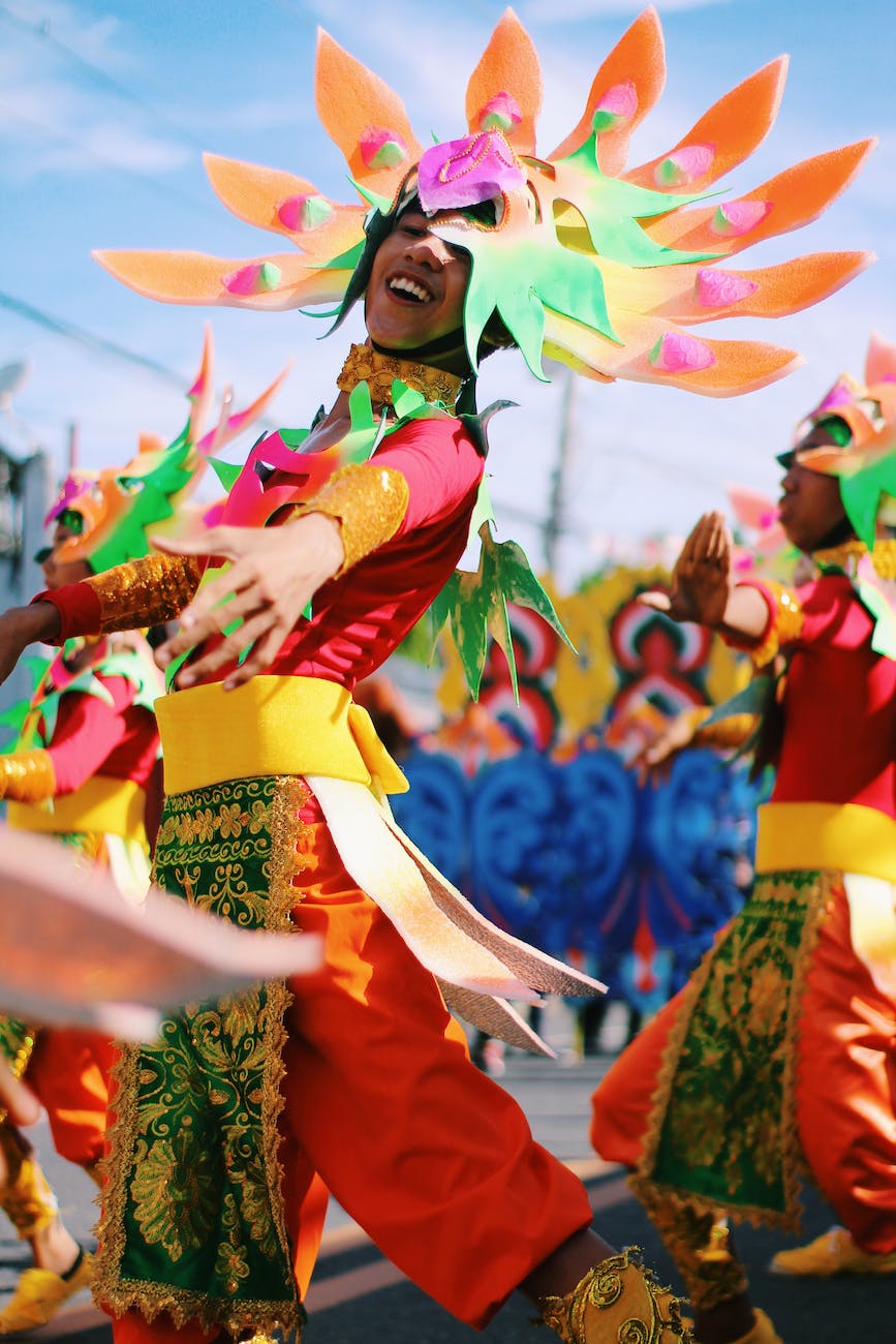 shallow focus photography of person wearing multicolored costume